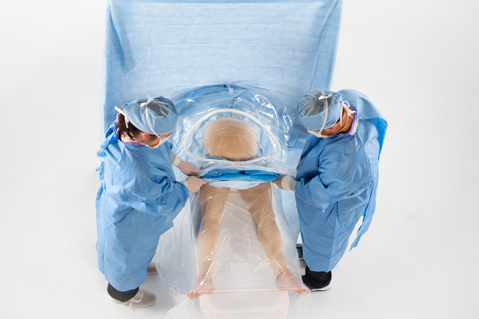 Obstetric drape for c-sections (cesarean) which opens to a clear view of the patient to reveal hemorrhage